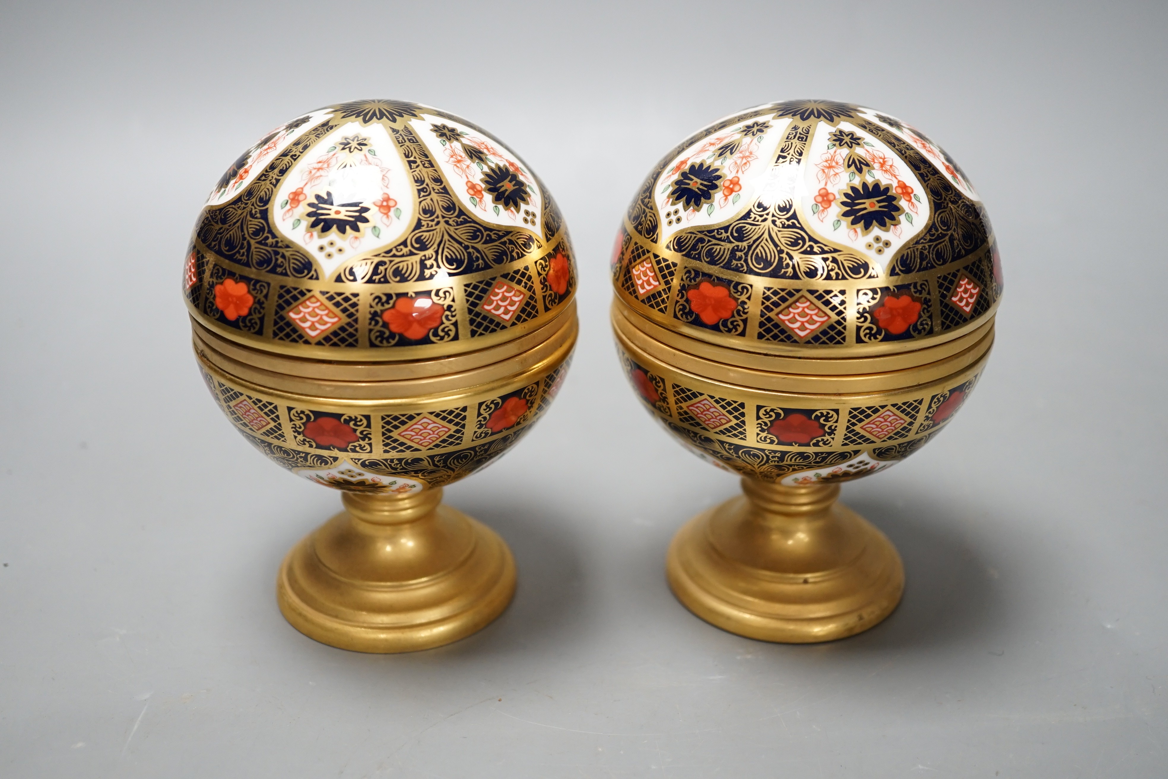 A Royal Crown Derby Millennium globe thermometer and a Millennium globe aneroid barometer, 13cms high